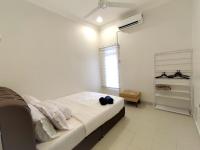 AA Homestay Bandar Mahkota Banting客房内的一张或多张床位