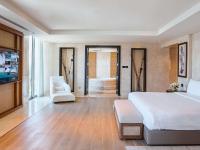 Rixos The Palm Hotel &amp; Suites - Ultra All Inclusive客房内的一张或多张床位