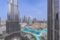 迪拜Address Residences Dubai Opera - Burj Khalifa City Views 1, 2, &amp; 3-Bedroom Apartment 1 minute walk to Burj Khalifa, Dubai Mall, Dubai Fountain by Heaven Crest的鸟瞰高楼林立的城市