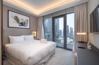 Address Residences Dubai Opera - Burj Khalifa City Views 1, 2, &amp; 3-Bedroom Apartment 1 minute walk to Burj Khalifa, Dubai Mall, Dubai Fountain by Heaven Crest客房内的一张或多张床位