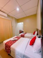 De Clinique Hotel客房内的一张或多张床位