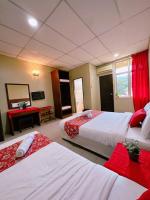 De Clinique Hotel客房内的一张或多张床位