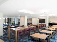 Mercure Sydney Macquarie Park的电视和/或娱乐中心