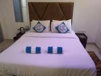 The Balaji inn Baga客房内的一张或多张床位