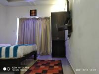 The Balaji inn Baga客房内的一张或多张床位