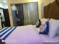 The Balaji inn Baga客房内的一张或多张床位