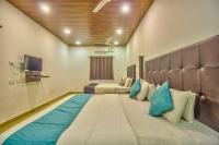 The Balaji inn Baga客房内的一张或多张床位