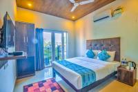 The Balaji inn Baga客房内的一张或多张床位