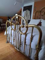 Gîte au Charme Victorien客房内的一张或多张床位