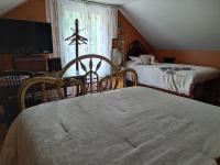 Gîte au Charme Victorien客房内的一张或多张床位