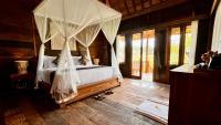 Jagadhita Villas Ubud Bali客房内的一张或多张床位