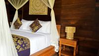 Jagadhita Villas Ubud Bali客房内的一张或多张床位