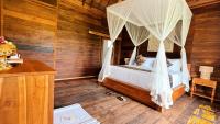 Jagadhita Villas Ubud Bali客房内的一张或多张床位
