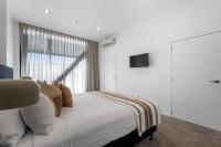 Southwark Hotel & Apartments客房内的一张或多张床位
