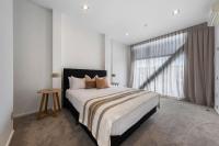 Southwark Hotel & Apartments客房内的一张或多张床位