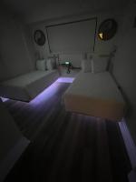 Luxe by the Sea - 5-Star Beachfront Escape客房内的一张或多张床位