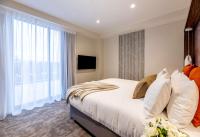 Sudima Christchurch City客房内的一张或多张床位
