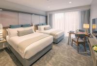 Sudima Christchurch City客房内的一张或多张床位