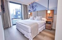 Riu Plaza Manhattan Times Square客房内的一张或多张床位