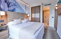 Riu Plaza Manhattan Times Square客房内的一张或多张床位