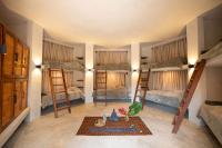 Leisy's Garden Hostel & Rooms客房内的一张或多张床位