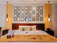 Allegro Hoi An . A Little Luxury Hotel & Spa客房内的一张或多张床位