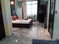 Mazola Diamond Hotel客房内的一张或多张床位