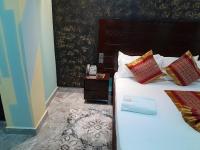Mazola Diamond Hotel客房内的一张或多张床位