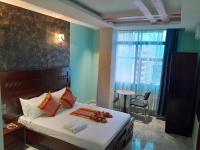 Mazola Diamond Hotel客房内的一张或多张床位