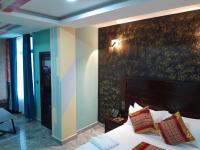 Mazola Diamond Hotel客房内的一张或多张床位