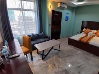 Mazola Diamond Hotel客房内的一张或多张床位
