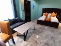 Mazola Diamond Hotel客房内的一张或多张床位