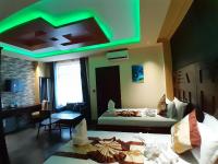 Mazola Diamond Hotel客房内的一张或多张床位