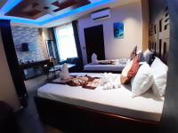 Mazola Diamond Hotel客房内的一张或多张床位