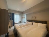 Hotel Keihan Nagoya客房内的一张或多张床位