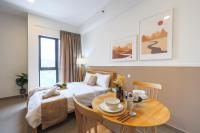 Mossaz Suites by MyKey客房内的一张或多张床位