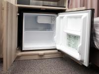 Hotel Route Inn Suzaka客房内的一张或多张床位