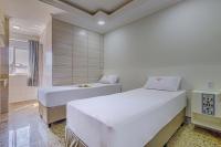 Hotel Age - Próximo Arena Corinthians e Aeroporto de Guarulhos客房内的一张或多张床位