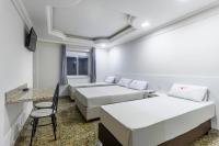 Hotel Age - Próximo Arena Corinthians e Aeroporto de Guarulhos的电视和/或娱乐中心
