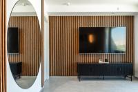 Luxury Apartments And Studios At Sea Side By Rently的电视和&#47;或娱乐中心