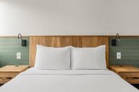Hotel Canoe and Suites客房内的一张或多张床位