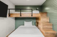 Hotel Canoe and Suites客房内的一张或多张床位