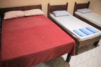 JBR Tourist Inn II - Port Barton客房内的一张或多张床位
