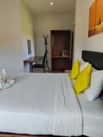 The Lodge at Koh Kood客房内的一张或多张床位