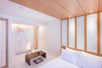 Hotel Yusurim客房内的一张或多张床位