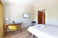 B&B Hotel Affi - Lago di Garda客房内的一张或多张床位