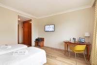 B&B Hotel Affi - Lago di Garda客房内的一张或多张床位