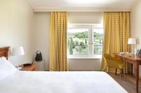 B&B Hotel Affi - Lago di Garda客房内的一张或多张床位