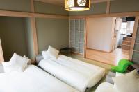 青い池まで車で20分Biei Breeze Reserve客房内的一张或多张床位