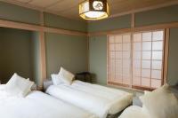 青い池まで車で20分Biei Breeze Reserve客房内的一张或多张床位